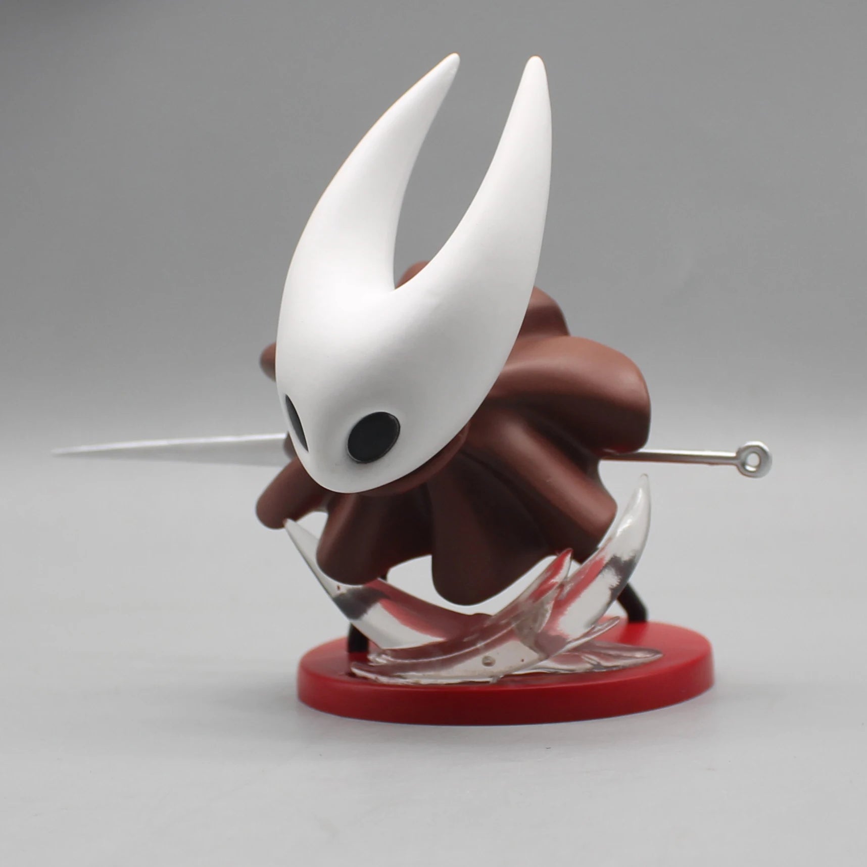 Full view of the Hornet collectible figure in a dynamic pose, ready for her journey in Silksong