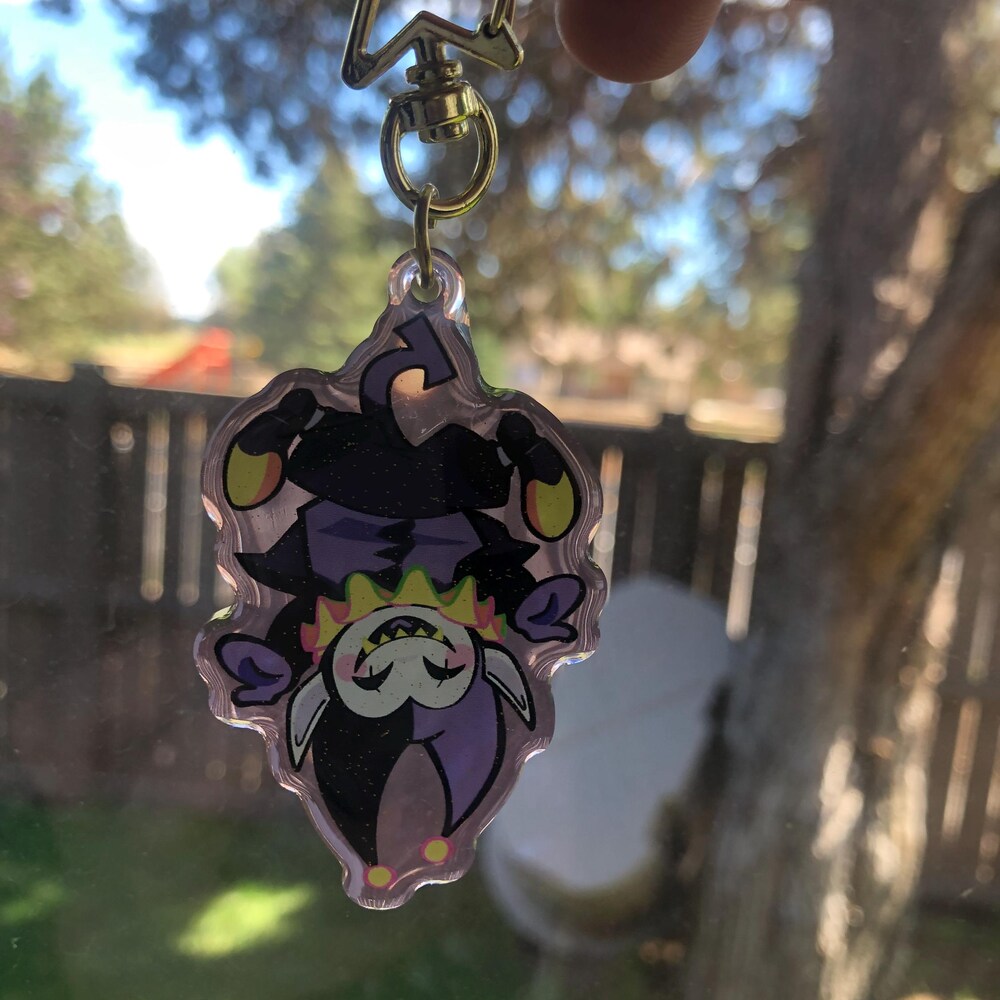 The Jevil Keychain presented as a thoughtful gift for a DELTARUNE fan or collector.