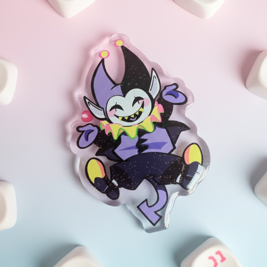 Jevil keychain on a pink and blue gradient background with decorative letters.