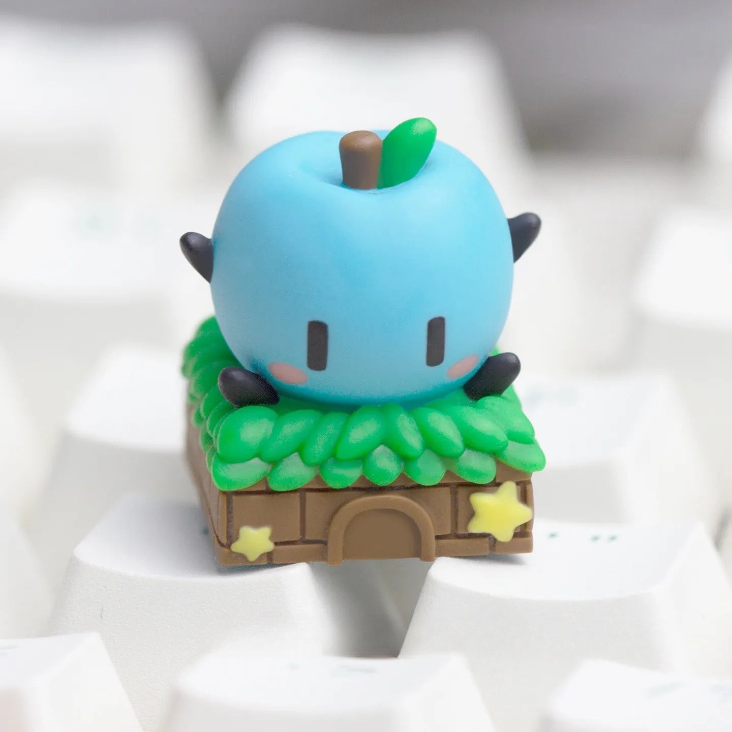 Blue Junimo Stardew Valley Keycap on a mechanical keyboard