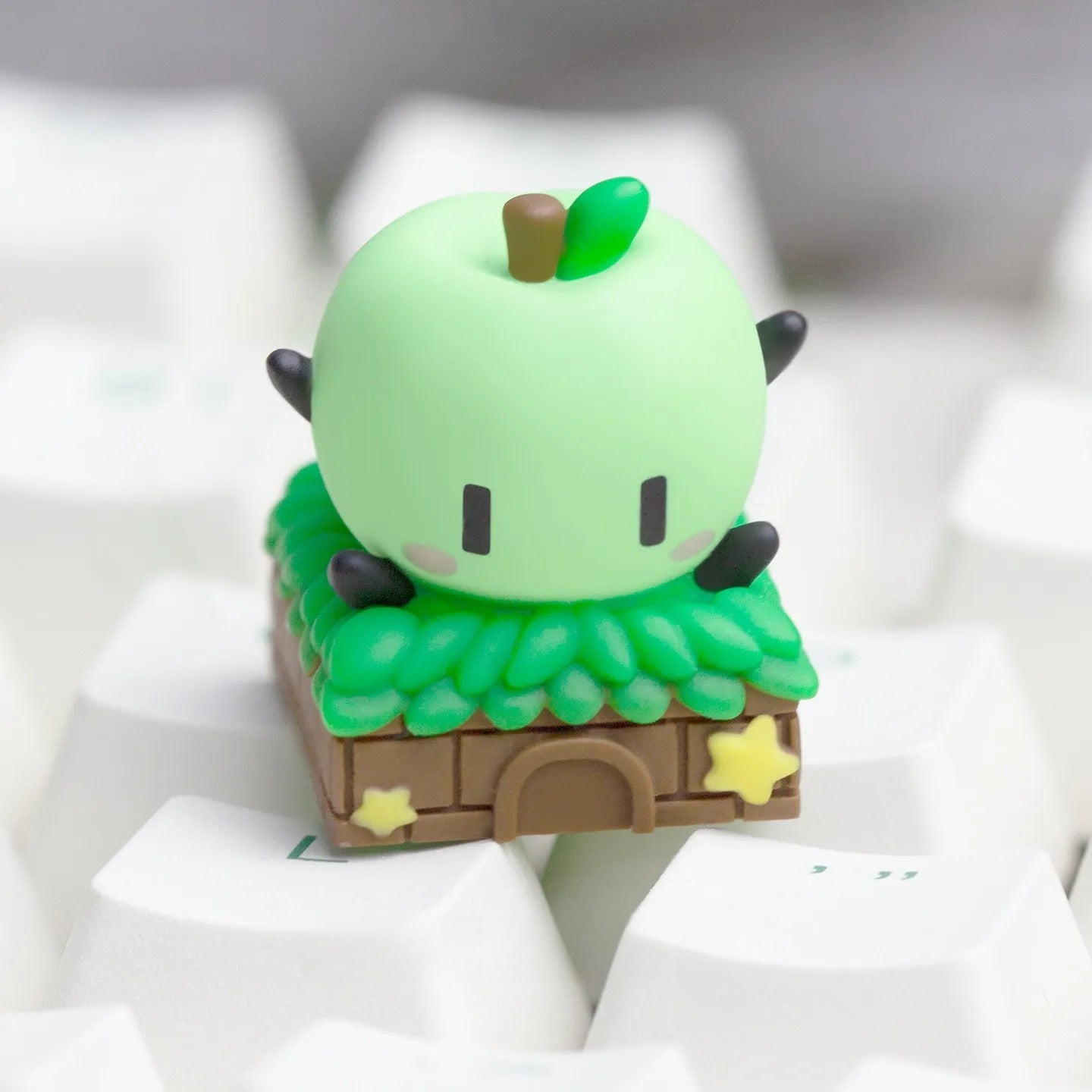 Green Junimo Stardew Valley Keycap on a mechanical keyboard