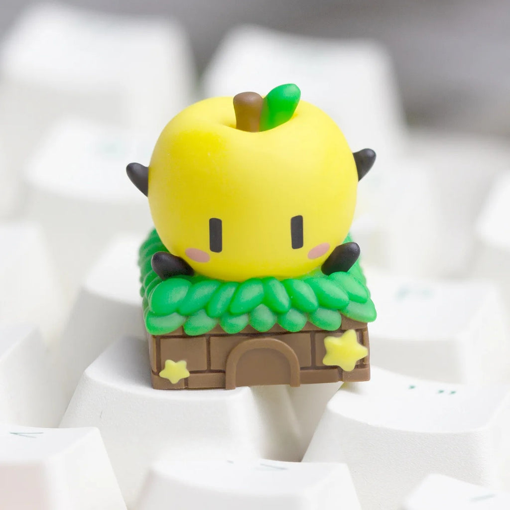 Yellow Junimo Stardew Valley Keycap on a mechanical keyboard