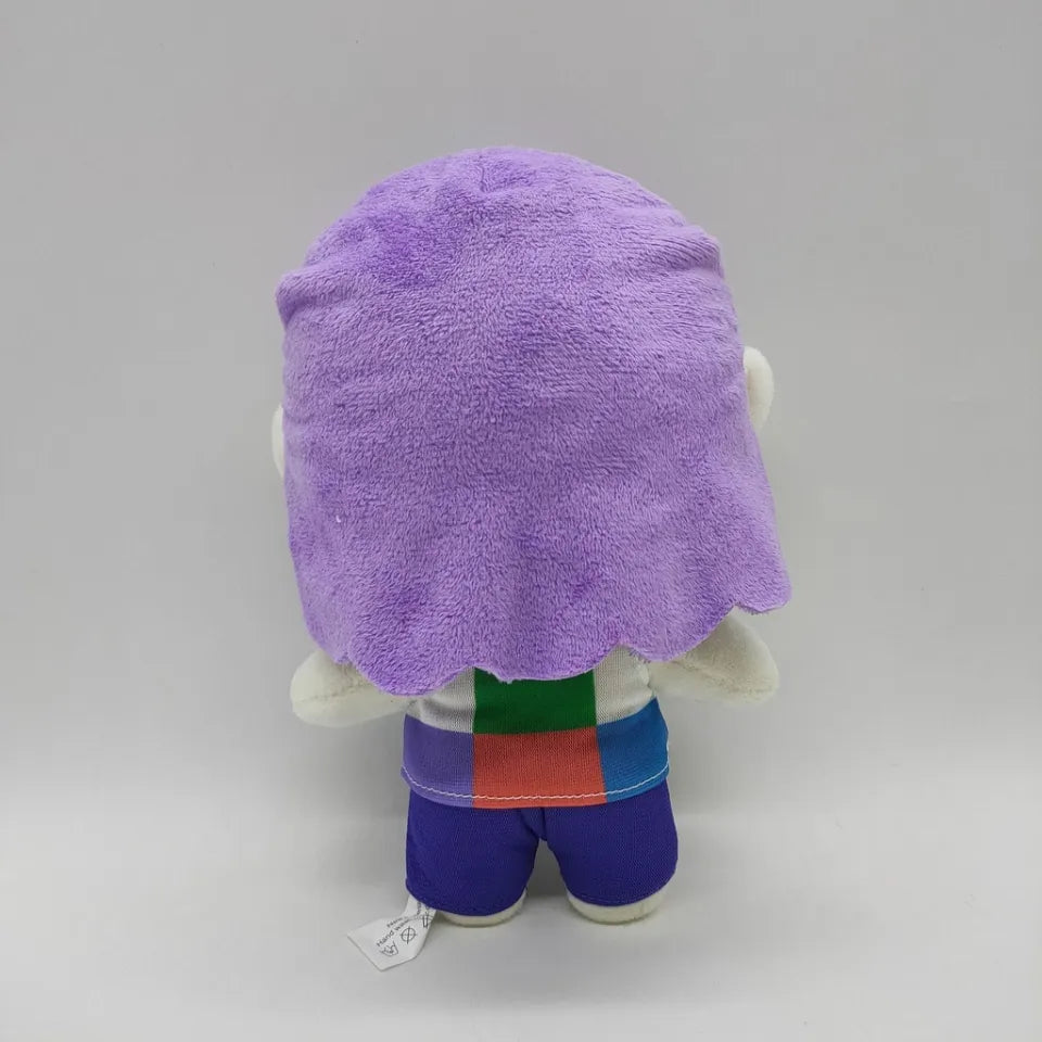 Close-up of the KEL Plush Toy's head and face, highlighting the detailed stitching and soft short plush material.
