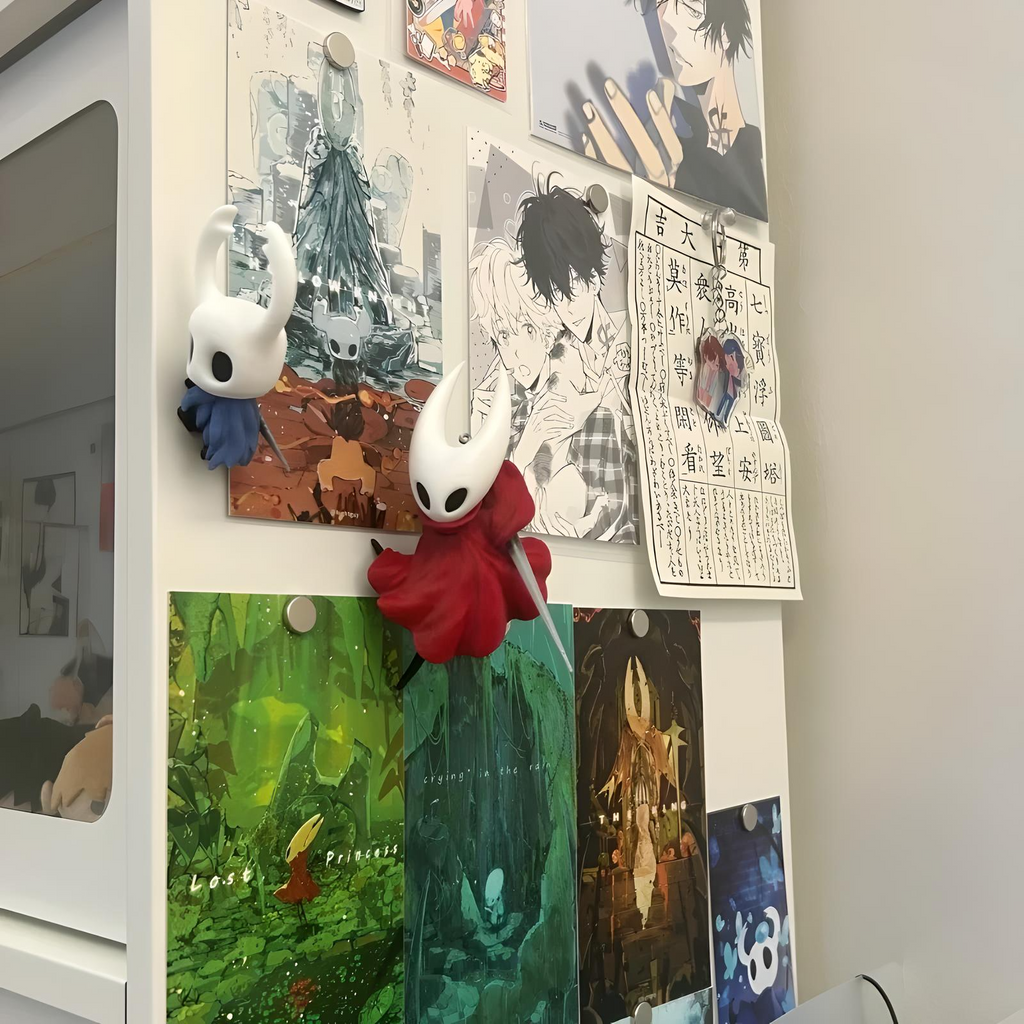 The Knight and Hornet Refrigerator Magnet displayed on a fridge door holding a note, showing its practical use and size