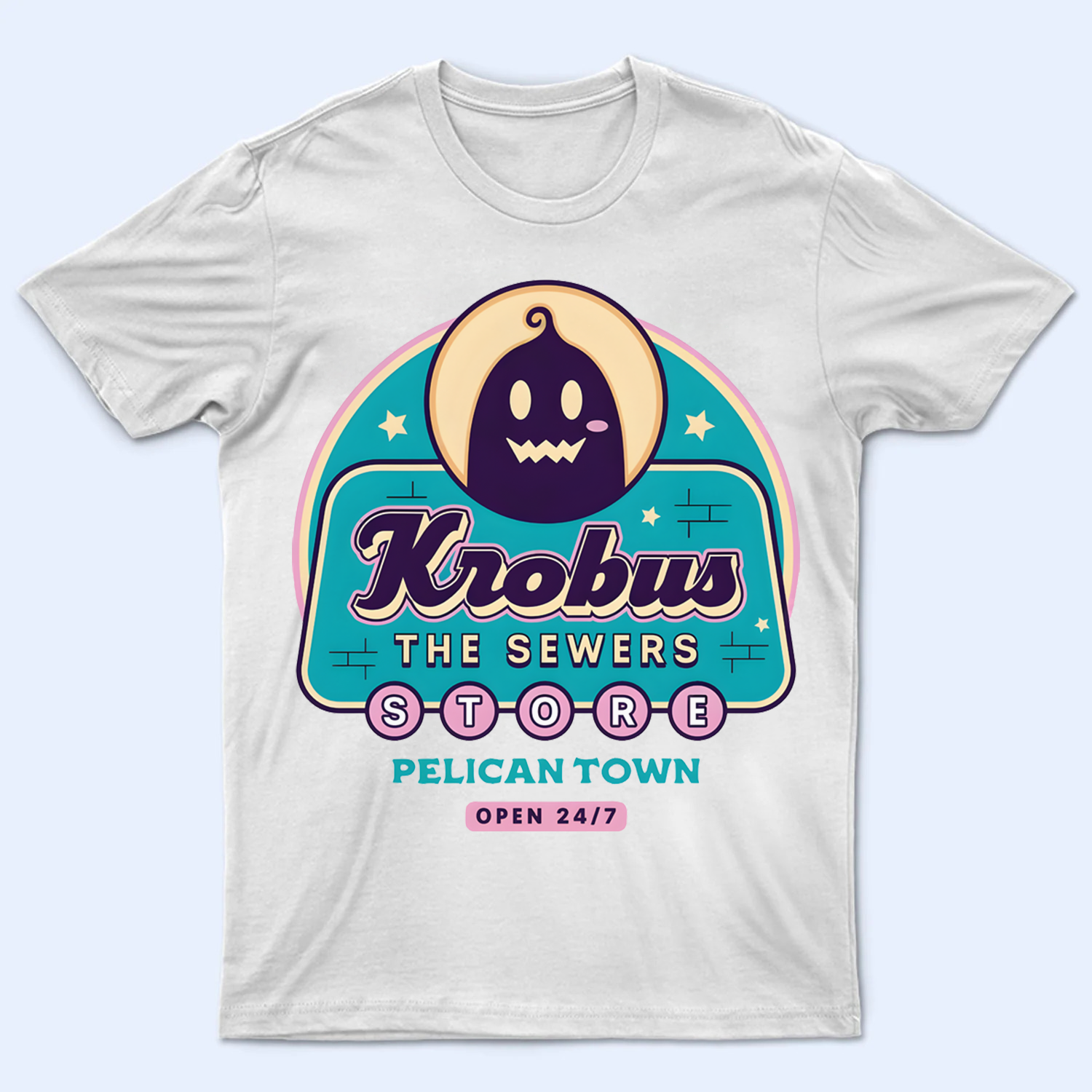 Mockup of a 'Krobus, The Sewers, Store Pelican Town, Open 24/7' Stardew Valley t-shirt, featuring the unique text design.