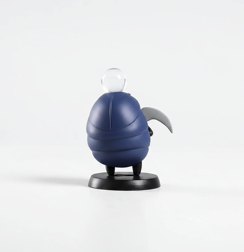 Back view of the Myla Mini Figure, an essential Hollow Knight Merch collectible with her lamp and pickaxe.