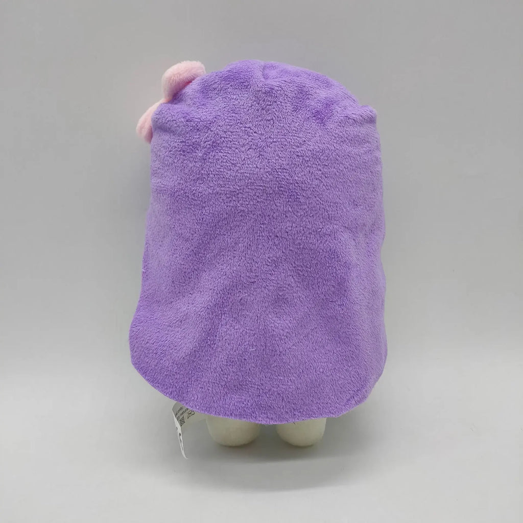 back view of the Omori AUBREY Plush Toy, showing her pink hair, striped shirt