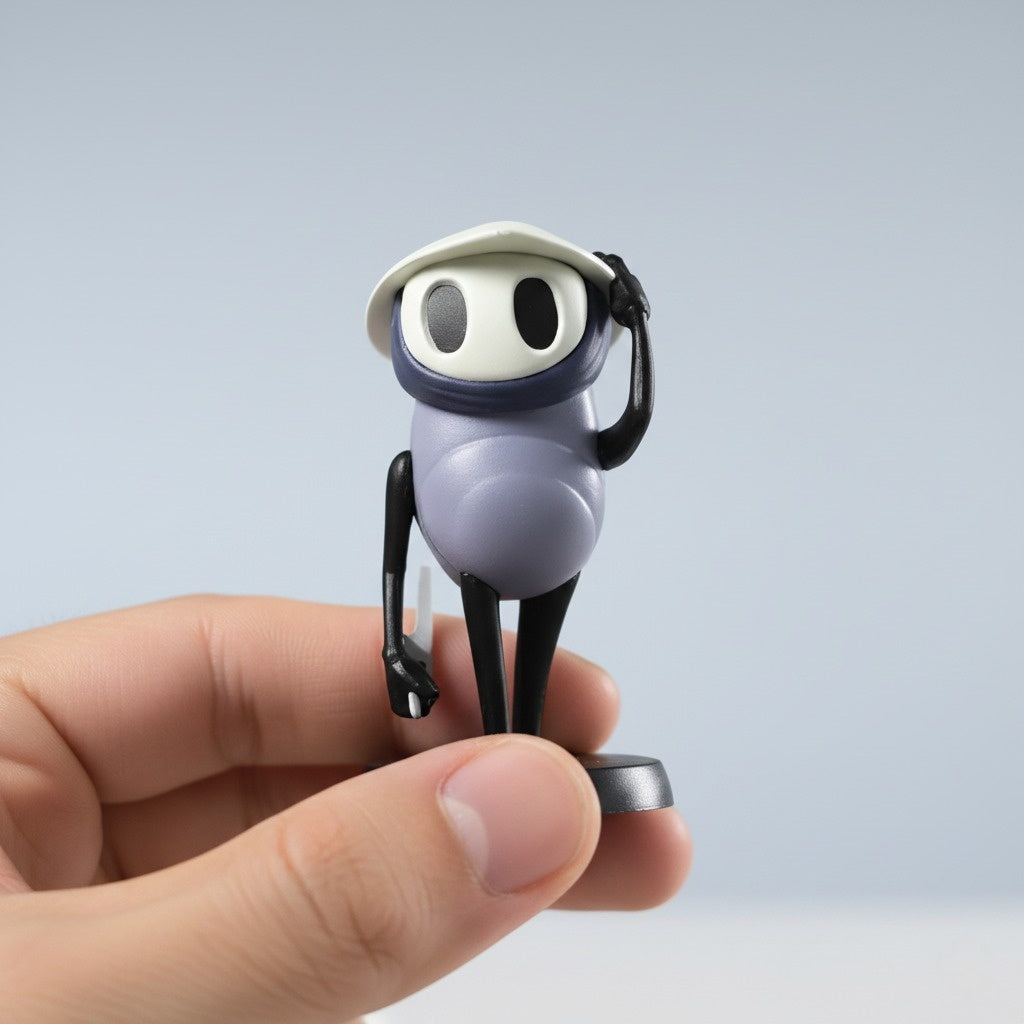 Close-up detail of the Quirrel Mini Figure, highlighting his mask, nail, and overall adventurous design.