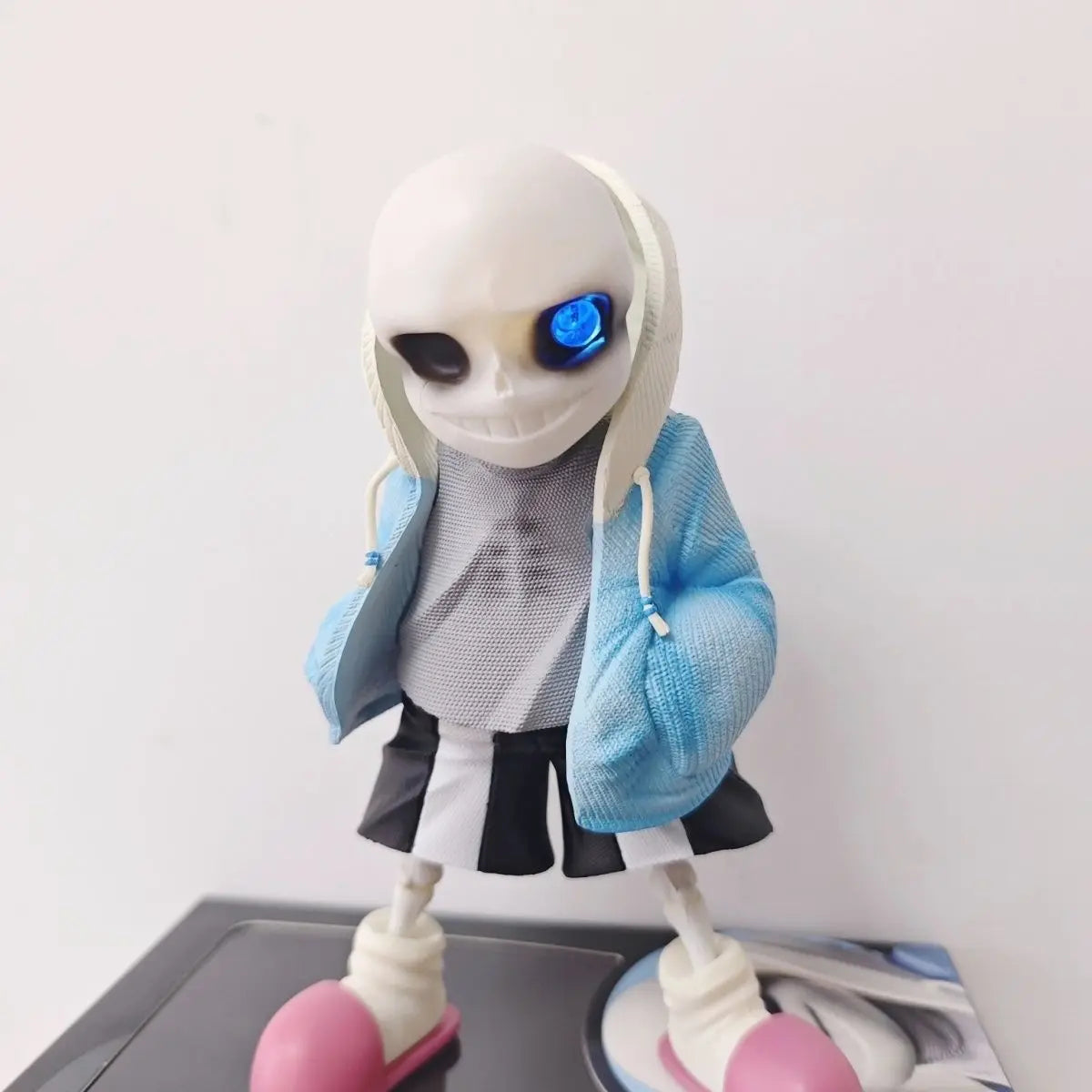 Close-up of the Sans Figure, highlighting the quality and detail of this Undertale Merch item.
