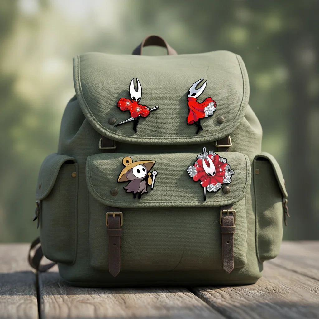 Individual Hornet and Sherma pins from the Silksong Enamel Pin Set, ready for collection.