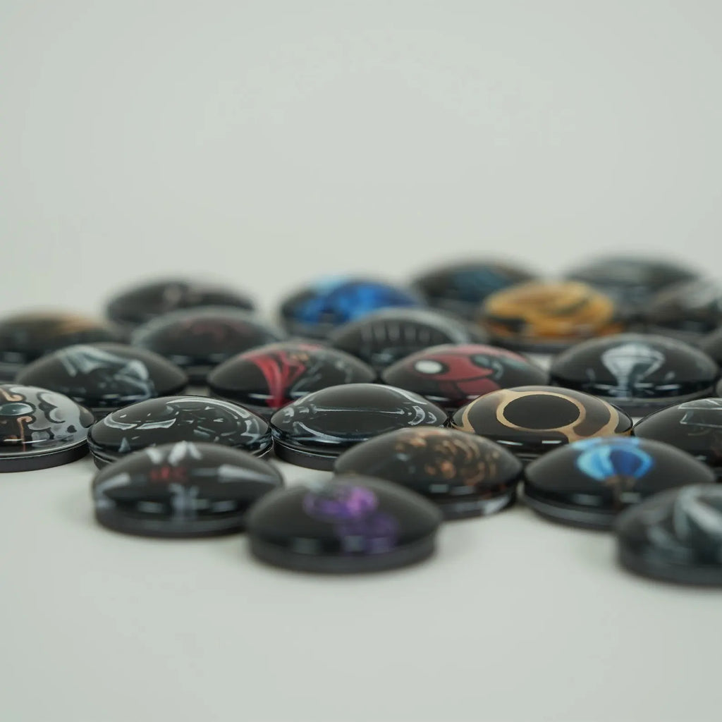 Collection of Silksong Charms with various charms from the game on a light gray background