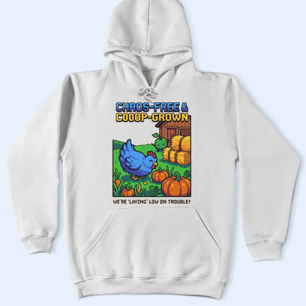 A white Stardew Valley Chaos-Free hoodie featuring a cute chicken and Junimo graphic