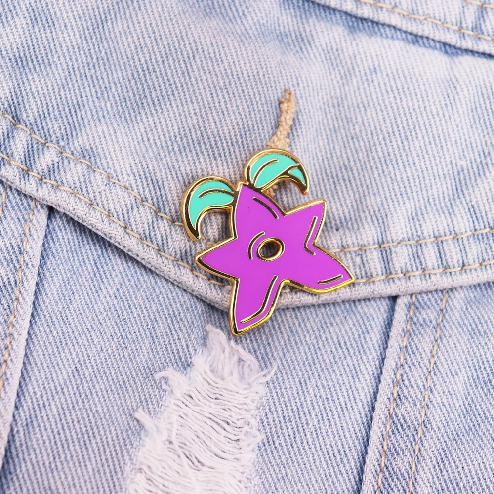 Stardrop Enamel Pin displayed on a backpack, highlighting its use as a decorative collectible badge.