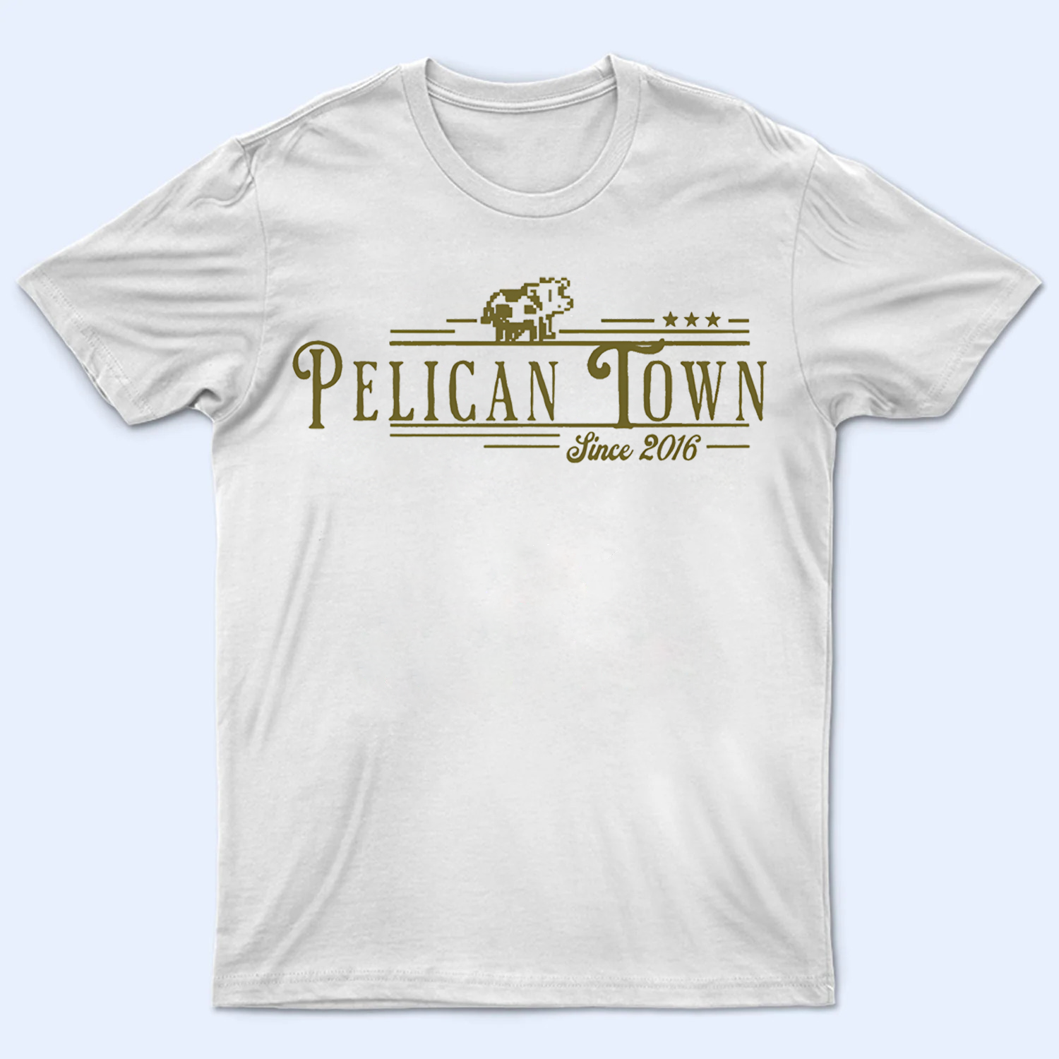 Mockup of a 'Pelican Town since 2016' Stardew Valley t-shirt, featuring the iconic game location and founding year