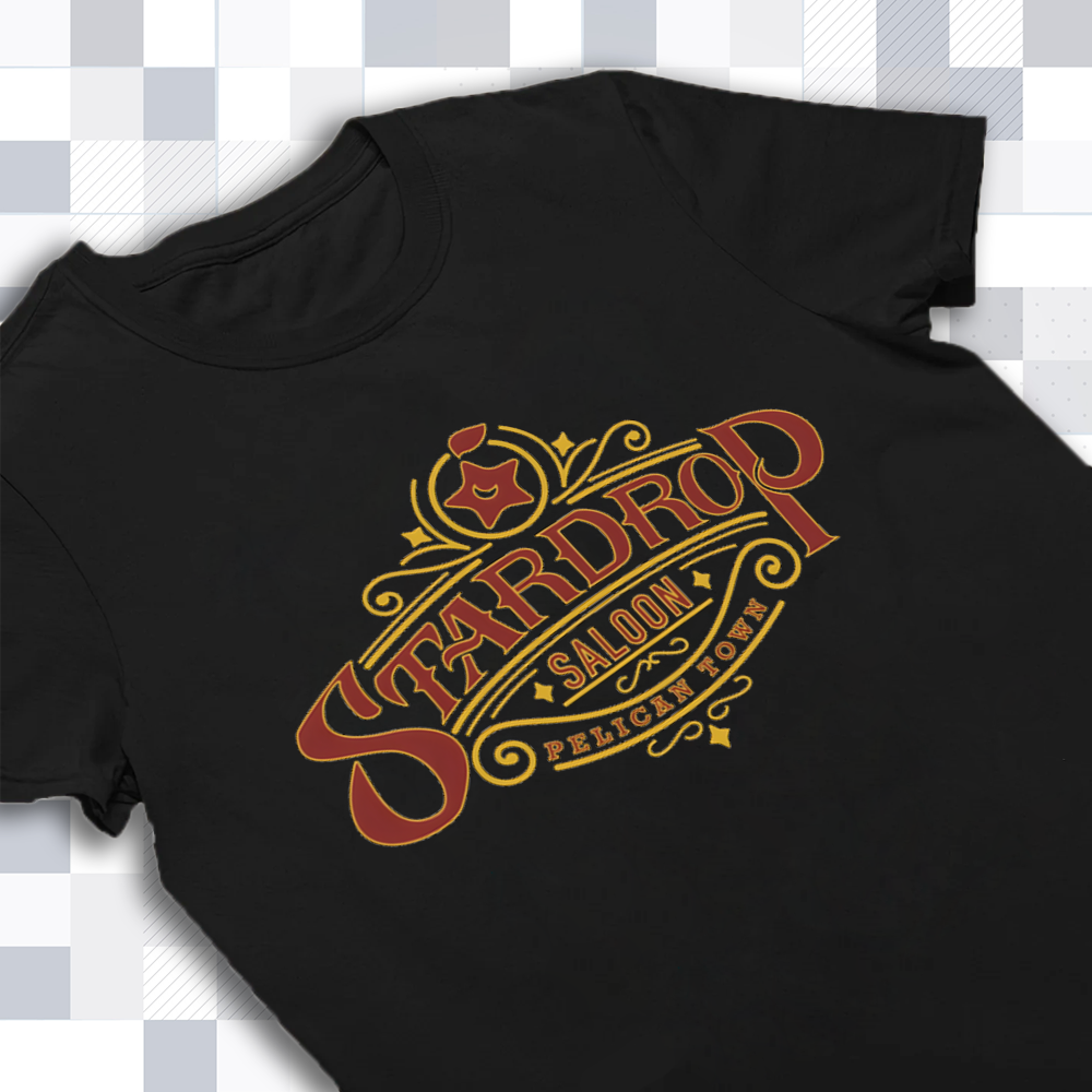 Close-up of the vintage-style Stardrop Saloon typography printed on a premium cotton t-shirt