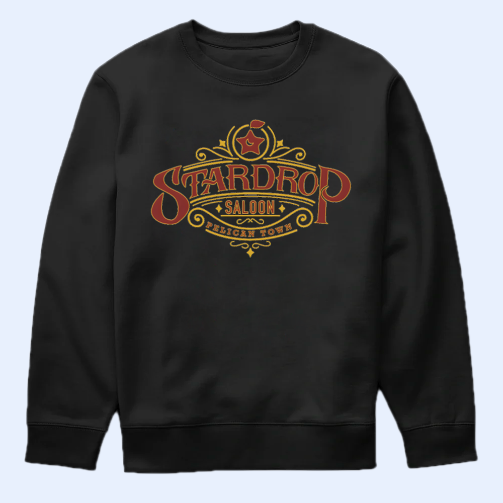 Black sweatshirt with 'Stardrop Saloon' graphic design on a light blue background