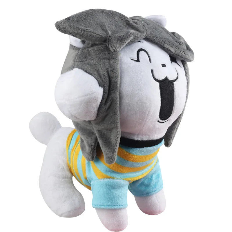Close-up of Temmie Plush Toy face, highlighting the expressive eyes and soft stuffed texture.