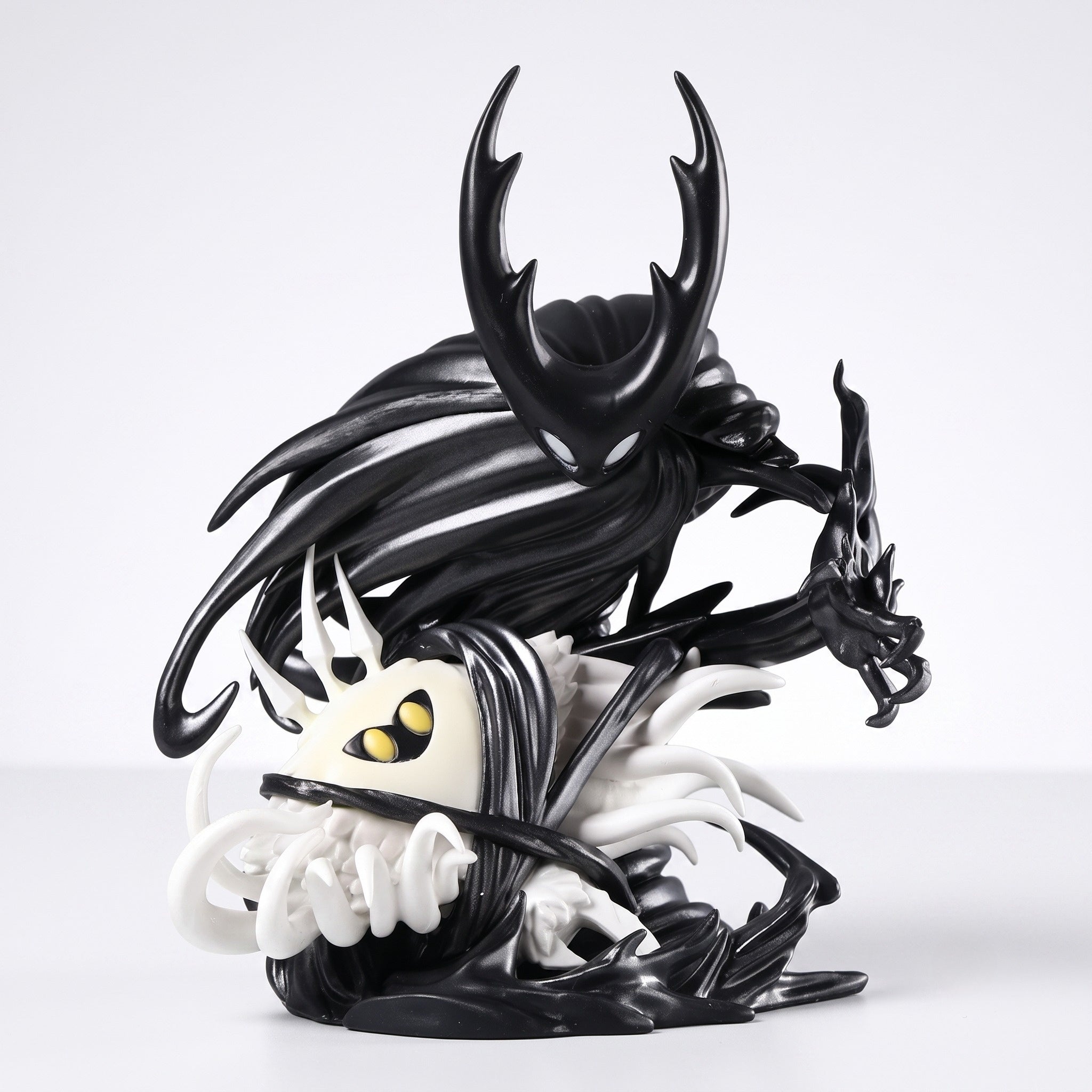 Front view of The Hollow Knight & The Radiance Figure showing the infected Vessel and blazing Radiance, premium Hollow Knight Merch.