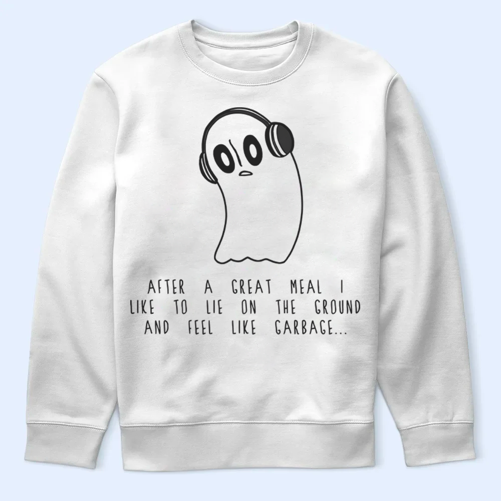 White sweatshirt with a ghost graphic and text on a light blue background