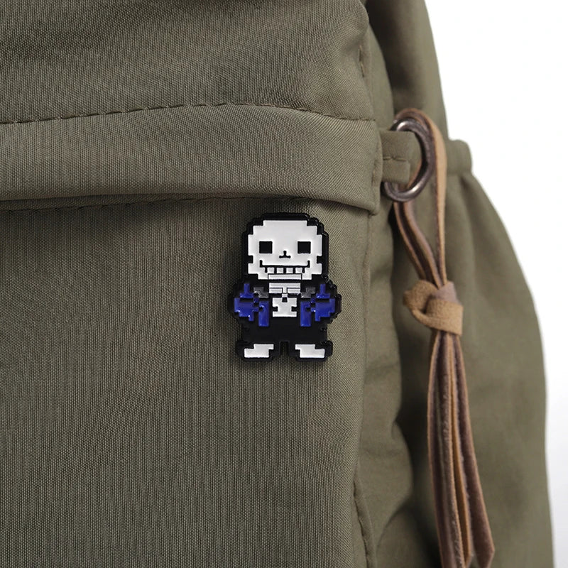 Undertale Merch Sans Enamel Pins decorating a backpack, showcasing its use as apparel decoration.